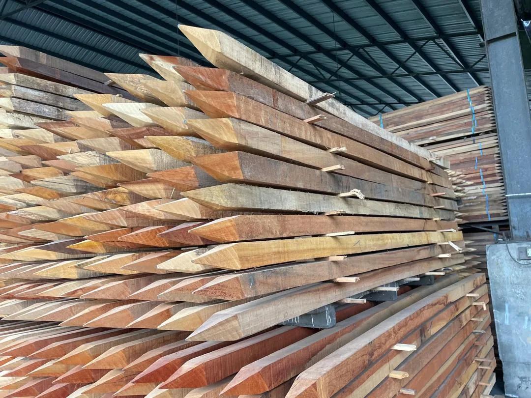Long pointed timber stakes in production storage